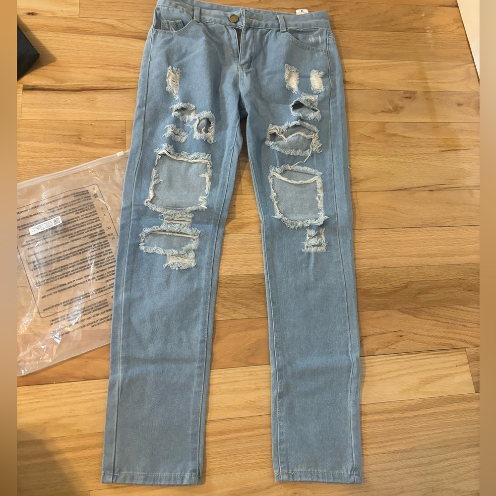 brand new size medium light wash jeans